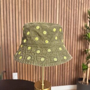 Urban Outfitters | Olive Bucket Hat with Yellow Smiley Faces